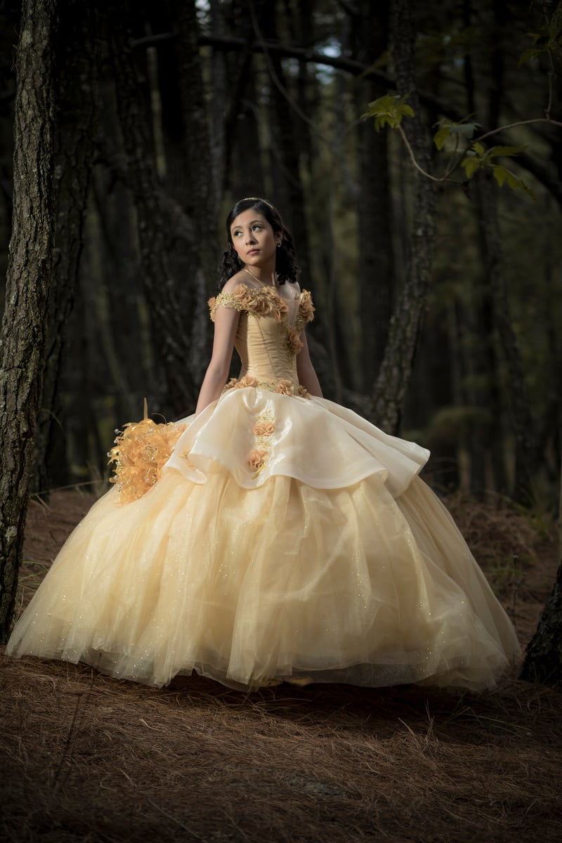 Female Teenager Wearing Her Yellow Ball Gown