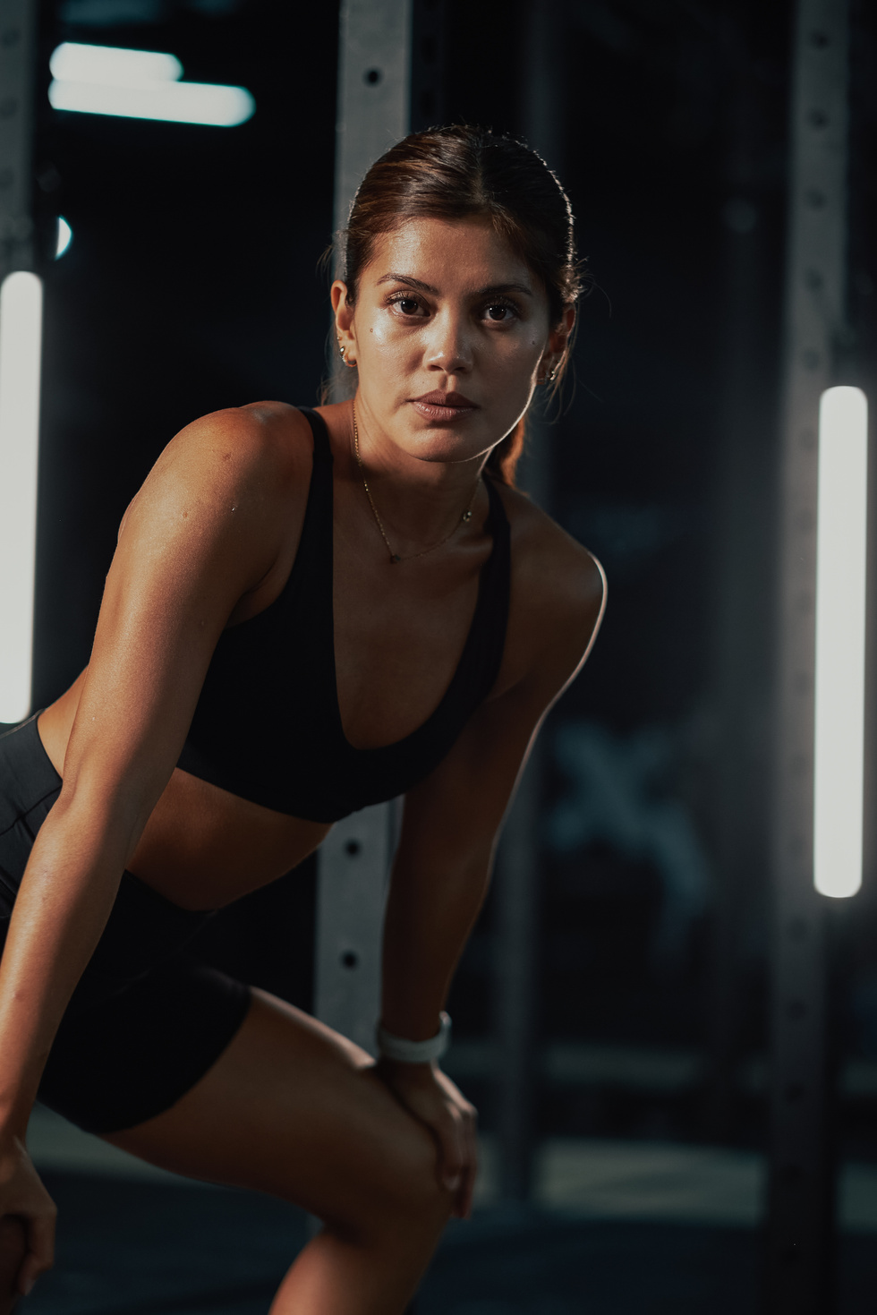 Female Trainers and Weightlifting Woman Training in a Gym