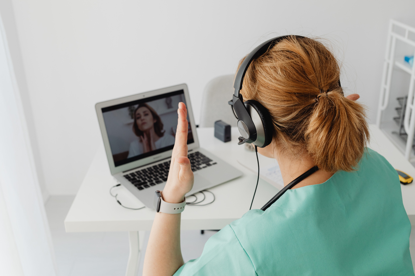Doctor Communicating with a Patient via Internet